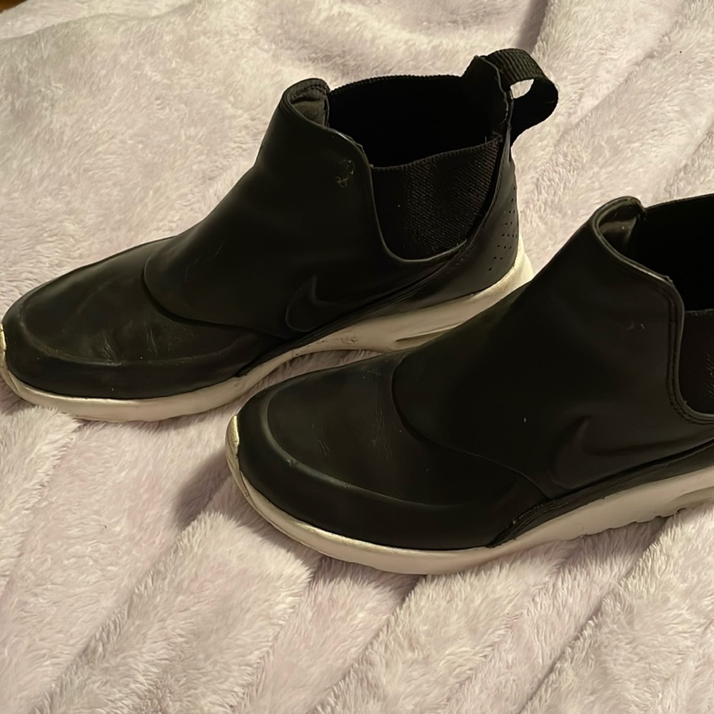 Black Nike leather high top slip-ons
